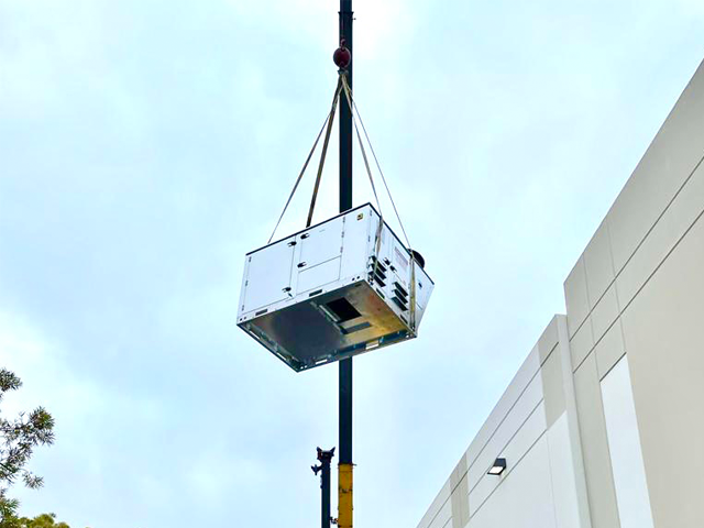 Seacliff mechanical equipment installation by crane
